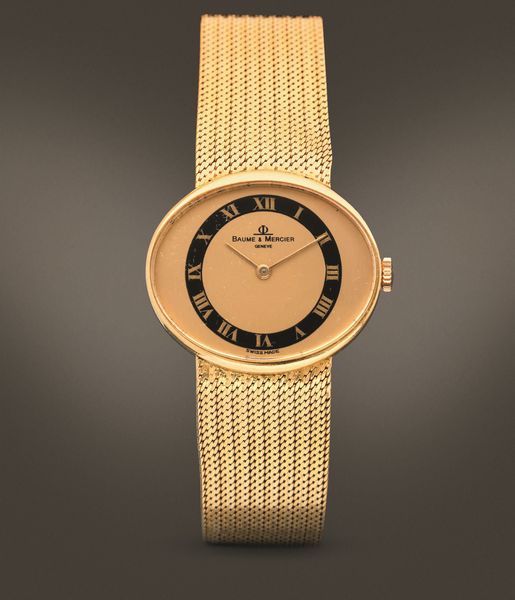 BAUME & MERCIER - Orologio da donna in oro 18k con bracciale integrato, quadrante champagne e nero con numeri Romani  - Asta Orologi da Polso e da Tasca - Associazione Nazionale - Case d'Asta italiane