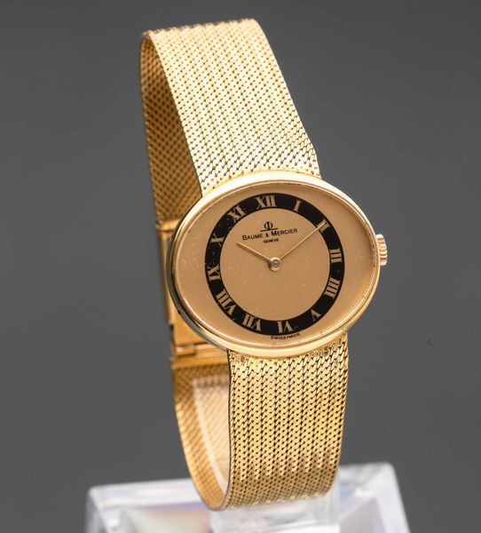 BAUME & MERCIER - Orologio da donna in oro 18k con bracciale integrato, quadrante champagne e nero con numeri Romani  - Asta Orologi da Polso e da Tasca - Associazione Nazionale - Case d'Asta italiane