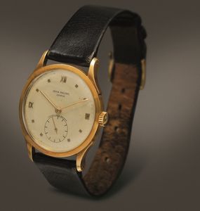 PATEK PHILIPPE - Calatrava 1589 in oro giallo 18k, carica manuale con anse riportate, indici Romani applicati, piccoli secondi e firma del rivenditore Oscar Linke Genova  - Asta Orologi da Polso e da Tasca - Associazione Nazionale - Case d'Asta italiane