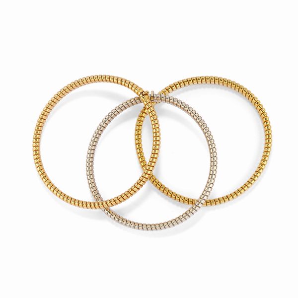 Tre bracciali in oro bicolore 18k  - Asta Gioielli - Associazione Nazionale - Case d'Asta italiane