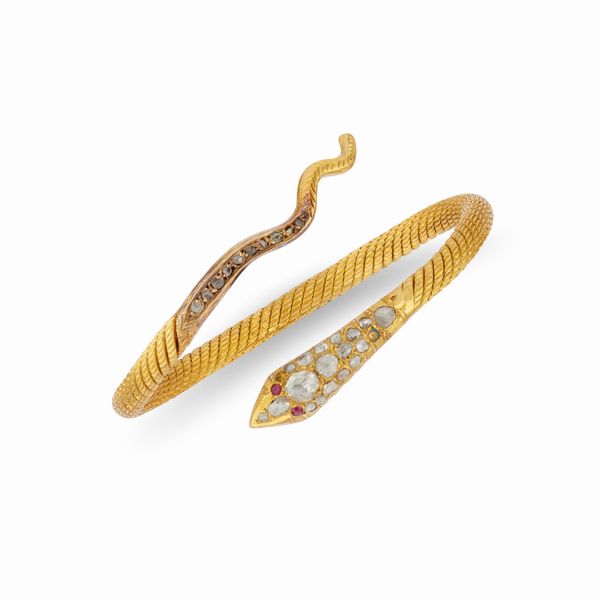 Bracciale in oro giallo 18k, diamanti e rubini  - Asta Gioielli - Associazione Nazionale - Case d'Asta italiane