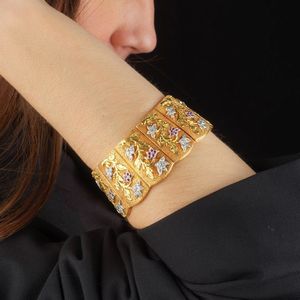 AMPIO BRACCIALE A FASCIA CON RUBINI E DIAMANTI  - Asta Gioielli - Associazione Nazionale - Case d'Asta italiane