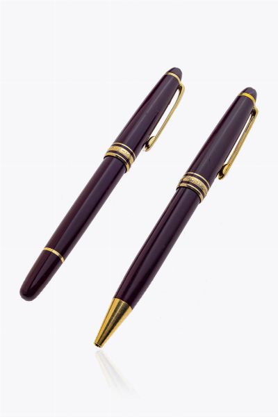 MONTBLANC : Penna a sfera e stilografica Montblanc  modello Meisterstck. Corpo e cappuccio in resina bordeaux  con lemblema Montblanc bianco intarsiato nella parte superiore del cappuccio. Presente sulla stilografica incise sulla resina le iniziali A.P.  - Asta Asta 205 Gioielli - Associazione Nazionale - Case d'Asta italiane