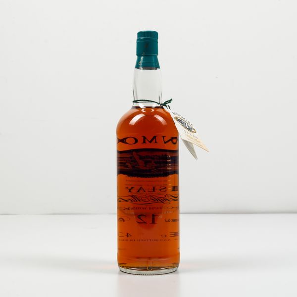 Bowmore, Islay Single Malt Scotch Whisky 12 years old  - Asta Spirito del tempo  - Associazione Nazionale - Case d'Asta italiane