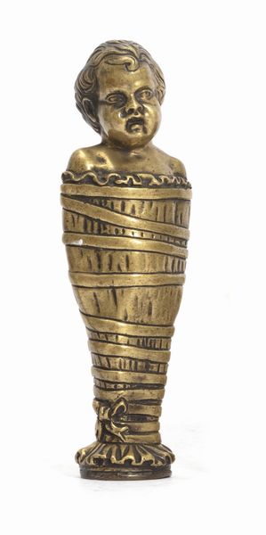 Sigillo in bronzo raffigurante bambino in fasce, secolo XIX  - Asta Incanti d'Arte - Associazione Nazionale - Case d'Asta italiane