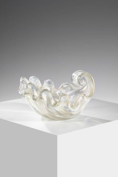 BAROVIER ERCOLE (1889 - 1974) : Conchiglia in vetro costolato trasparente, superficie iridata  - Asta Asta 376 | VETRI DI MURANO E DEL XX SECOLO E CERAMICHE - VETRI DI MURANO E FRANCESI, CERAMICHE Virtuale - Associazione Nazionale - Case d'Asta italiane