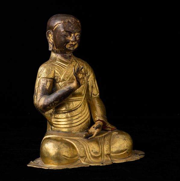 Figura di monaco in rame parzialmente dorato con tracce di policromia, Tibet, XVIII secolo  - Asta Fine chinese works of art - Associazione Nazionale - Case d'Asta italiane