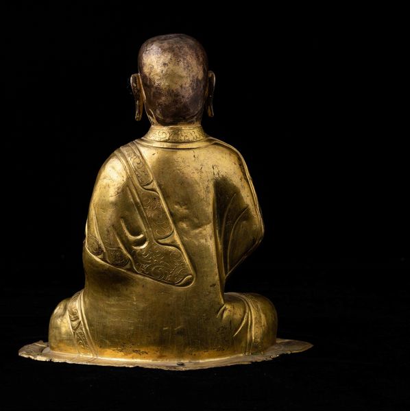 Figura di monaco in rame parzialmente dorato con tracce di policromia, Tibet, XVIII secolo  - Asta Fine chinese works of art - Associazione Nazionale - Case d'Asta italiane