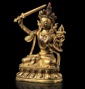 Figura di Manjushri seduta su doppio fiore di loto in bronzo dorato, tracce do policromia e innesti di pietre dure, Cina, Dinastia Qing, epoca Qianlong (1736-1796)  - Asta Fine chinese works of art - Associazione Nazionale - Case d'Asta italiane