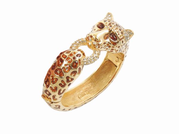 Bracciale rigido animalier in metallo dorato, Ciner  - Asta Abiti e accessori vintage  - Associazione Nazionale - Case d'Asta italiane