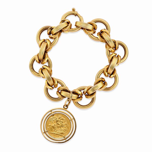 Bracciale in oro giallo 18K e moneta  - Asta Argenti dal XVIII al XX secolo - Associazione Nazionale - Case d'Asta italiane