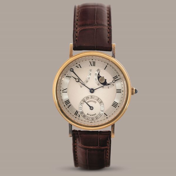 BREGUET - Classique Reserve de Marche, ref 3137BA in oro giallo 18k, carica automatica con fondello a vista e massa oscillante cesellata, fasi lunari e calendario.  - Asta Orologio da polso e da tasca  - Associazione Nazionale - Case d'Asta italiane