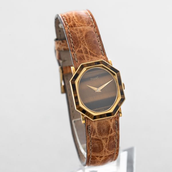 PIAGET - Lady in oro 18k con quadrante e ghiera in Occhio di Tigre, sfere in oro, movimento extrapiatto carica manuale  - Asta Orologio da polso e da tasca  - Associazione Nazionale - Case d'Asta italiane