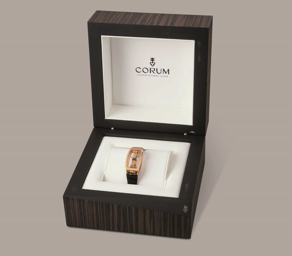 CORUM - Golden Bridge in oro rosa 18k con pav di brillanti, movimento a vista disposto su ponte verticale a carica manuale, mai indossato con scatola e garanzia  - Asta Orologio da polso e da tasca  - Associazione Nazionale - Case d'Asta italiane