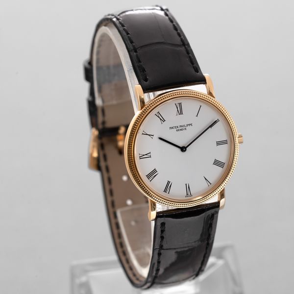 PATEK PHILIPPE - Elegante Calatrava Clos de Paris in oro giallo 18k, quadrante bianco con numeri Romani, carica manuale  - Asta Orologio da polso e da tasca  - Associazione Nazionale - Case d'Asta italiane