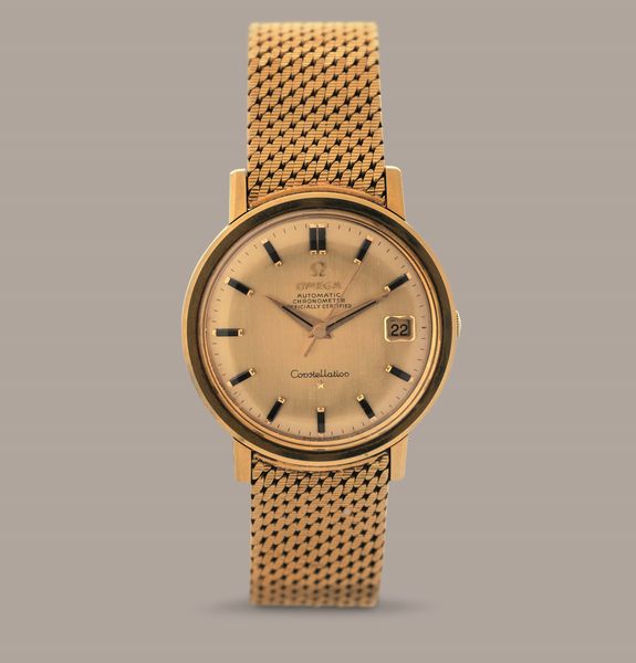 OMEGA - Costellation in oro giallo 18k, quadrante dorato con indici in Onice e datario, bracciale maglia milanese originale con chiusura a scatoletta, carica automatica  - Asta Orologio da polso e da tasca  - Associazione Nazionale - Case d'Asta italiane