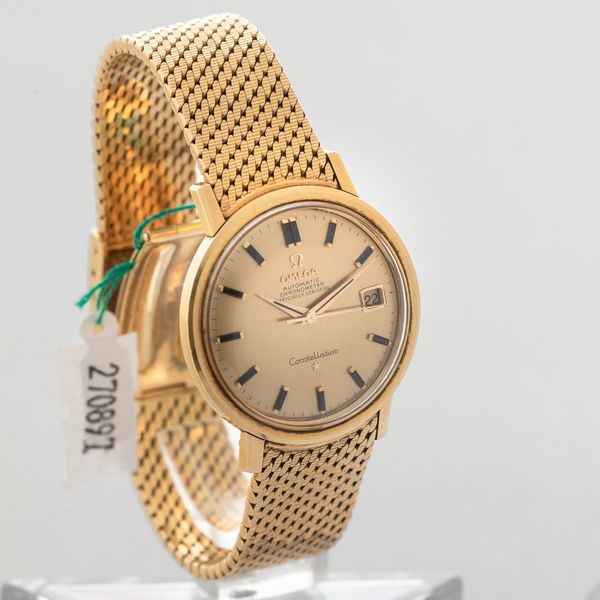 OMEGA - Costellation in oro giallo 18k, quadrante dorato con indici in Onice e datario, bracciale maglia milanese originale con chiusura a scatoletta, carica automatica  - Asta Orologio da polso e da tasca  - Associazione Nazionale - Case d'Asta italiane