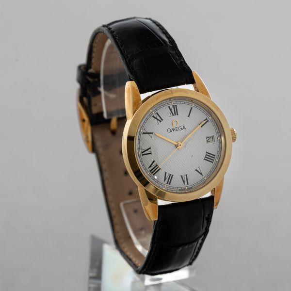 OMEGA - Louis Brandt in oro giallo 18k, quadrante bianco guiloch con numeri Romani e datario, movimento automatico a vita e astuccio originale  - Asta Orologio da polso e da tasca  - Associazione Nazionale - Case d'Asta italiane