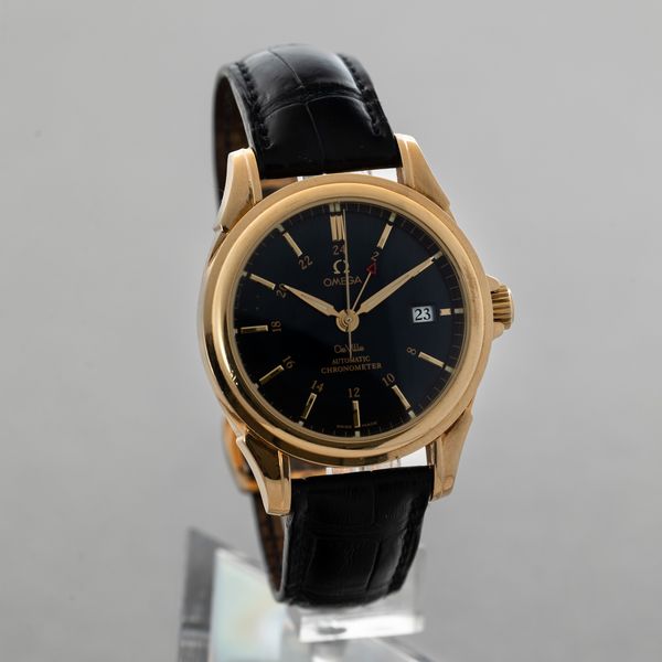 OMEGA - De Ville Coaxial in oro giallo 18k, automatico con scappamento Coassiale, datario e doppio fuso orario accompagnato da scatola e garanzia  - Asta Orologio da polso e da tasca  - Associazione Nazionale - Case d'Asta italiane