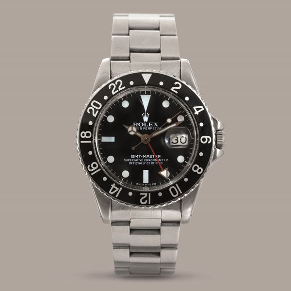 ROLEX - GMT MASTER ref 16750, in acciaio con ghiera girevole bidirezionale nera, quadrante nero al trizio datario e sfera delle 24 ore, carica automatica  - Asta Orologio da polso e da tasca  - Associazione Nazionale - Case d'Asta italiane