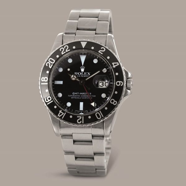 ROLEX - GMT MASTER ref 16750, in acciaio con ghiera girevole bidirezionale nera, quadrante nero al trizio datario e sfera delle 24 ore, carica automatica  - Asta Orologio da polso e da tasca  - Associazione Nazionale - Case d'Asta italiane