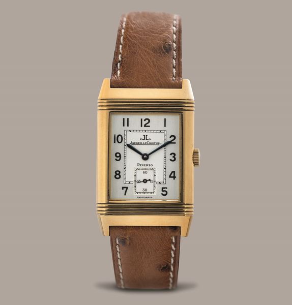 JAEGER LECOULTRE - Reverso Grand Taille, quadrante Argent bitonale con numeri Arabi, piccoli secondi e cassa in oro 18k reversibile. Accompagnato da scatola e garanzia  - Asta Orologio da polso e da tasca  - Associazione Nazionale - Case d'Asta italiane