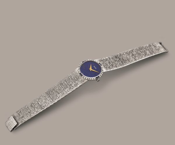 PIAGET - Raffinato orologio femminile da sera in oro bianco 18k, quadrante in Lapis e ghiera diamanti e zaffiri, carica manuale  - Asta Orologio da polso e da tasca  - Associazione Nazionale - Case d'Asta italiane