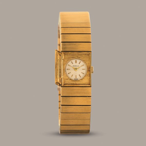 GUBELIN - Montre a Secret in oro giallo 18k con apertura laterale a pressione nascosta, quadrante argent con indici applicati movimento a carica manuale  - Asta Orologio da polso e da tasca  - Associazione Nazionale - Case d'Asta italiane