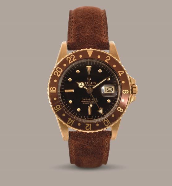 ROLEX - GMT Master ref 1675 Occhio di Tigre in oro giallo 18k, quadrante Nipple marrone, ghiera girevole, movimento automatico  - Asta Orologio da polso e da tasca  - Associazione Nazionale - Case d'Asta italiane