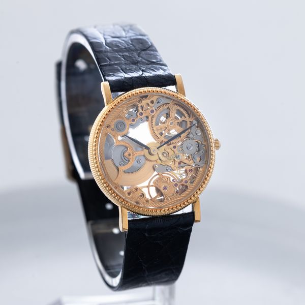 UNIVERSAL GENEVE - Raro orologio Scheletrato in oro 18k, solo tempo carica automatica con microrotore a vista, Nos con tag  - Asta Orologio da polso e da tasca  - Associazione Nazionale - Case d'Asta italiane