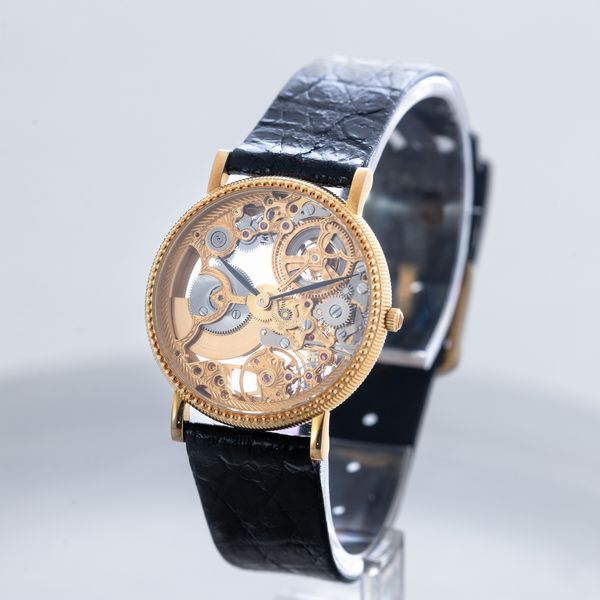 UNIVERSAL GENEVE - Raro orologio Scheletrato in oro 18k, solo tempo carica automatica con microrotore a vista, Nos con tag  - Asta Orologio da polso e da tasca  - Associazione Nazionale - Case d'Asta italiane