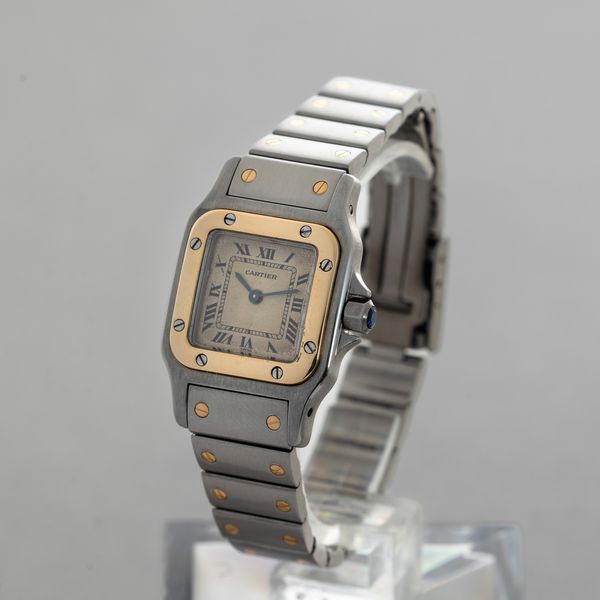 CARTIER - Santos Galbe acciaio e oro, quadrante Argent con numeri Romani, movimento al quarzo accompagnato da astuccio originale  - Asta Orologio da polso e da tasca  - Associazione Nazionale - Case d'Asta italiane