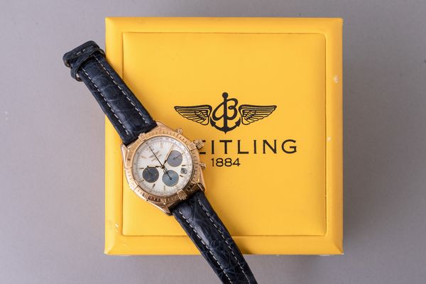 BREITLING - Chrono cockpit in oro giallo 18k, quadrante in madreperla con contatori azzurri, movimento automatico con scatola, garanzia e certificato di cronometria  - Asta Orologio da polso e da tasca  - Associazione Nazionale - Case d'Asta italiane