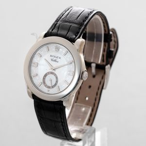 ROLEX - Cellini ref 5240 NOS, in platino con quadrante in madreperla, numeri arabi e secondi al sei, mai indossato corredato da scatola e garanzia  - Asta Orologio da polso e da tasca  - Associazione Nazionale - Case d'Asta italiane