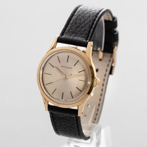 MOVADO - Solo tempo impermeabile, cassa in oro 18k con fondello a vite, quadrante Champagne con indici applicati, movimento a carica automatica  - Asta Orologio da polso e da tasca  - Associazione Nazionale - Case d'Asta italiane