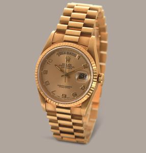 ROLEX - Daydate ref 18238 in oro giallo 18k, quadrante champagne con numeri Arabi applicati, indicazione di giorno e data, bracciale President con chiusura a scomparsa, movimento automatico  - Asta Orologio da polso e da tasca  - Associazione Nazionale - Case d'Asta italiane