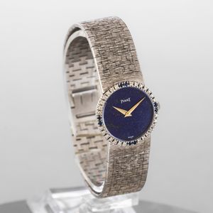 PIAGET - Raffinato orologio femminile da sera in oro bianco 18k, quadrante in Lapis e ghiera diamanti e zaffiri, carica manuale  - Asta Orologio da polso e da tasca  - Associazione Nazionale - Case d'Asta italiane