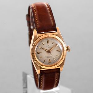 ROLEX - Ovetto ref 4777 in oro rosa 18k con ghiera lavorata, quadrante argento Gren con inidici e sfere luminose, secondi centrali e movimento automatico  - Asta Orologio da polso e da tasca  - Associazione Nazionale - Case d'Asta italiane