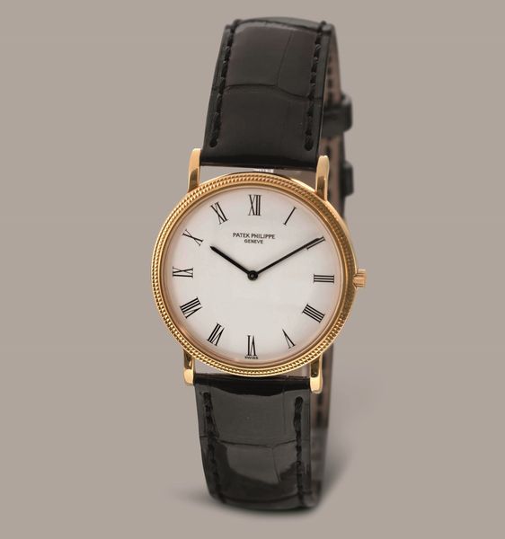 PATEK PHILIPPE - Elegante Calatrava Clos de Paris in oro giallo 18k, quadrante bianco con numeri Romani, carica manuale  - Asta Orologi da Polso e da Tasca - Associazione Nazionale - Case d'Asta italiane