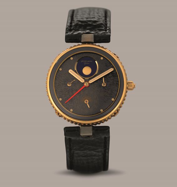 GERALD GENTA - Gefica calendario completo con fasi lunari in oro 18k, quadrante ardesia, anse Vendome, con scatola originale  - Asta Orologi da Polso e da Tasca - Associazione Nazionale - Case d'Asta italiane