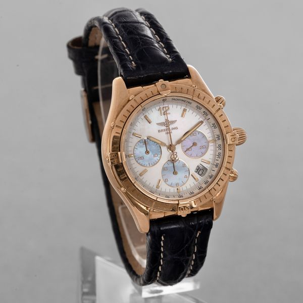 BREITLING - Chrono cockpit in oro giallo 18k, quadrante in madreperla con contatori azzurri, movimento automatico con scatola, garanzia e certificato di cronometria  - Asta Orologi da Polso e da Tasca - Associazione Nazionale - Case d'Asta italiane