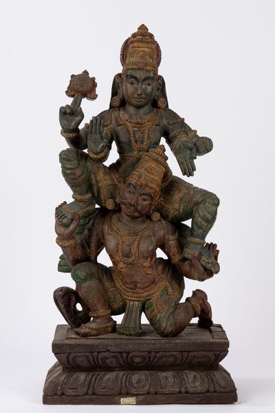 Scultura indiana in legno policromo raffigurante Parvati e Shiva. Secolo XX  - Asta Incanti d'Asia / Arte del sud-est asiatico e Cina - Associazione Nazionale - Case d'Asta italiane