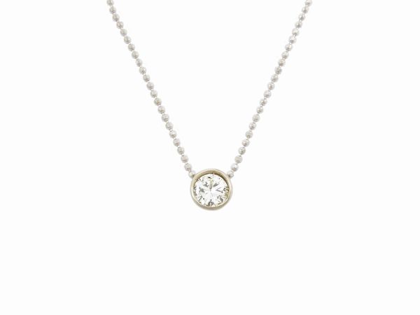 Collana puntoluce in oro bianco con diamante  - Asta Gioielli e orologi - Associazione Nazionale - Case d'Asta italiane