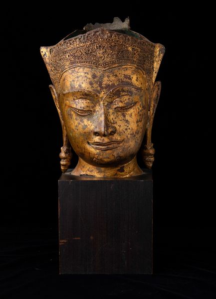 Testa Buddha in bronzo con tracce di doratura, Thailandia, XIX secolo  - Asta Arte orientale - Associazione Nazionale - Case d'Asta italiane