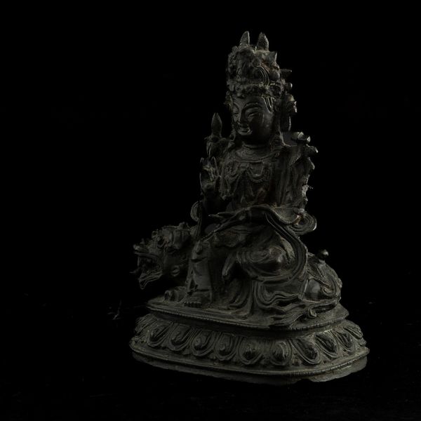 Figura di Buddha assiso su drago in bronzo, Cina, Dinastia Ming, XVII secolo  - Asta Fine Chinese Works of Art - Associazione Nazionale - Case d'Asta italiane