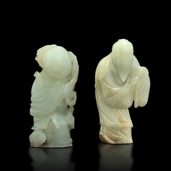 Lotto composto da due figurine scolpite in giada bianca e Celadon, Cina, Dinastia Qing, XIX secolo  - Asta Fine Chinese Works of Art - Associazione Nazionale - Case d'Asta italiane