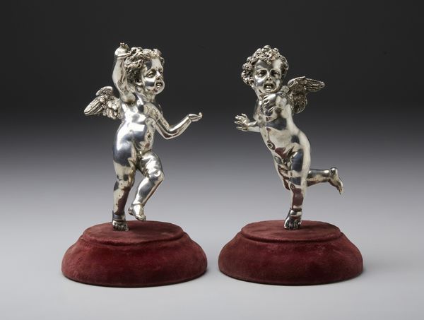 ARGENTIERE ITALIANO DEL XX SECOLO : Coppia di putti probabilmente in argento  - Asta Asta 401 | ARTE ANTICA E DEL XIX SECOLO Online - Associazione Nazionale - Case d'Asta italiane