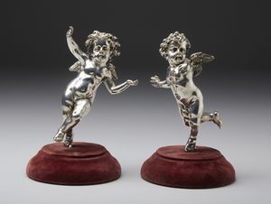 ARGENTIERE ITALIANO DEL XX SECOLO - Coppia di putti probabilmente in argento