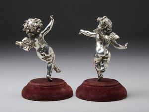 ARGENTIERE ITALIANO DEL XX SECOLO : Coppia di putti probabilmente in argento  - Asta Asta 401 | ARTE ANTICA E DEL XIX SECOLO Online - Associazione Nazionale - Case d'Asta italiane