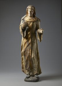 SCULTORE DEL XVI SECOLO - Figura di santa in legno intagliato e parzialmente dorato, probabilmente Santa Brigida o Santa Scolastica